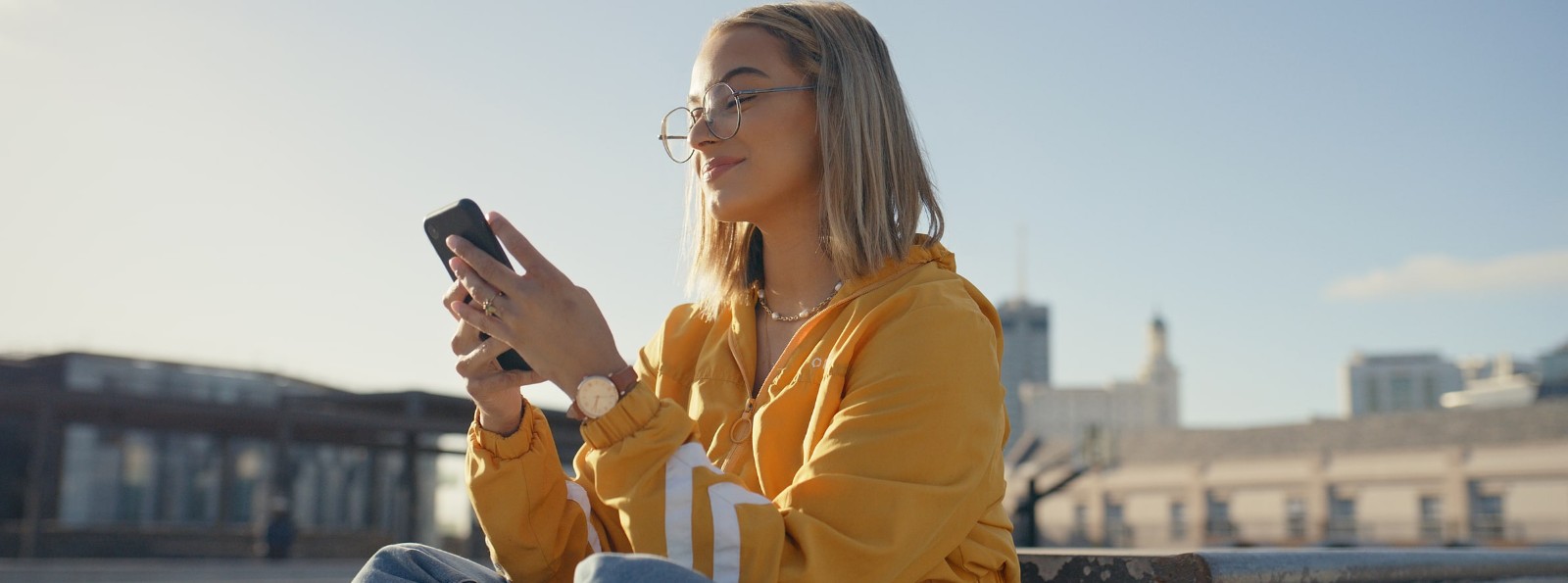 Person outside using their phone.